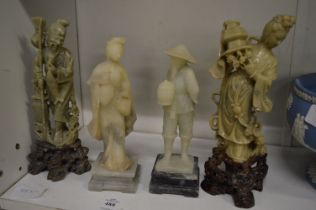 Four Chinese carved soap stone figures.