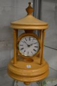 A good modern turned ash pagoda style mantle clock.