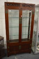 A Chinese hardwood standing display cabinet.