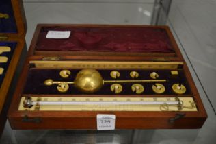 A mahogany case Sikes Hydrometer.