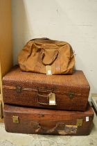 A holdall and two suitcases.