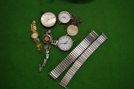 Silver pocket watch and other items.