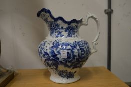 A large blue and white jug.