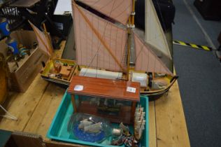 Large model ship and other similar smaller ships.