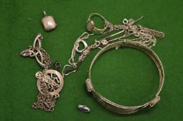 A small group of silver jewellery.