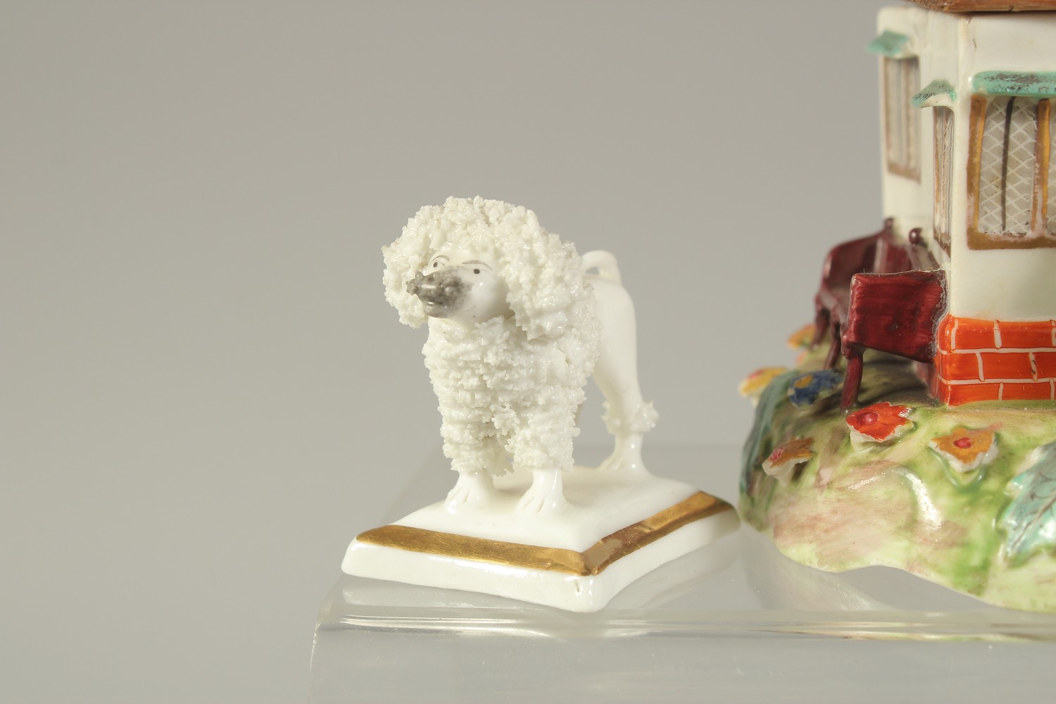 FOUR STAFFORDSHIRE TYPE POODLES, a similar ram and a ceramic cottage with wooden roof. - Image 2 of 7