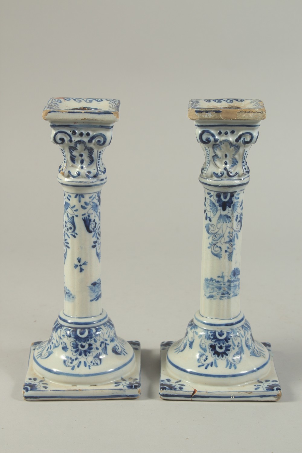 A PAIR OF DUTCH BLUE AND WHITE CANDLESTICKS on square bases. 10ins high. - Image 2 of 6