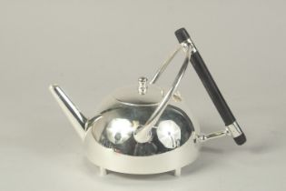 A CHRISTOPHER DRESSER DESIGN PLATED TEAPOT, circle.