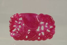 A CHINESE CARVED PINK TOURMALINE PENDANT. 7cms x 4.5cms.