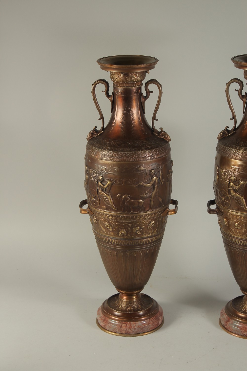 A SUPERB PAIR OF TWO-HANDLED CLASSICAL BRONZE URNS decorated with panels of classical figures. - Image 2 of 4