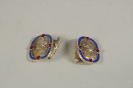 A PAIR OF RUSSIAN SILVER AND BLUE ENAMEL KING AND QUEEN CUFFLINKS. Mark Head 88. LP.