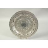 A SRI LANKAN CIRCULAR SILVER DISH decorated with bands of animals. 10ins diameter. Weight: 12ozs.