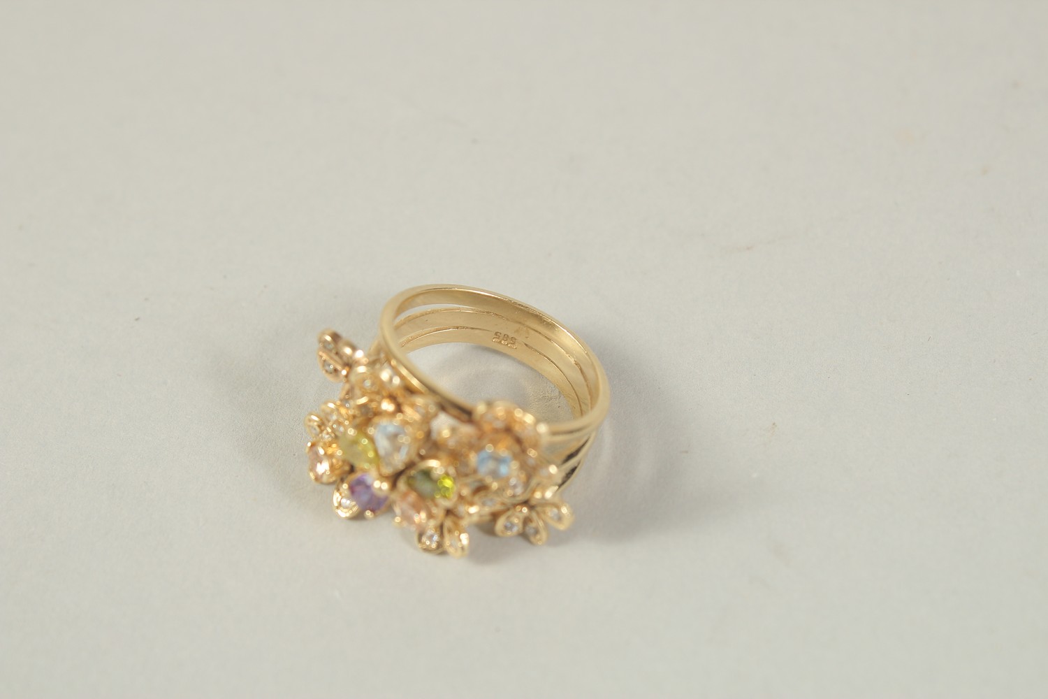 A 14CT GOLD FLOWER CLUSTER RING set with diamond, peridot, amethyst and aquamarine - Image 3 of 3