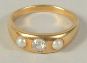 AN 18CT GOLD PEARL AND DIAMOND RING.