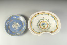 A FAIENCE SHAVING DISH AND A PLATE (2).