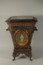 A LARGE VICTORIAN PONTYPOOL COAL BUCKET, with gilded glass panels, lift-up lid and carrying handles,