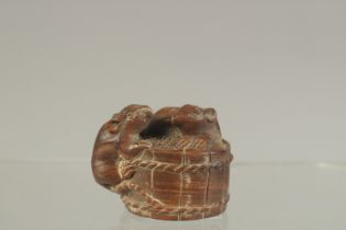 A CARVED HARDWOOD NETSUKE WITH TWO RATS. Signed. 4cms.