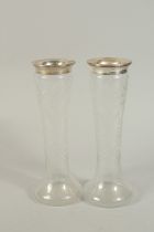 A PAIR OF SILVER RIMMED CUT GLASS VASES. London 1921. Maker W. & Co. 10ins high.