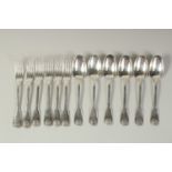 A SET OF SIX FIDDLE AND SKULL PATTERN DESSERT SPOONS AND SIX DESSERT FORKS. French silver. Weight: