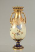 A ROYAL CROWN DERBY TWO-HANDLED VASE, painted with flowers on a yellow, blue and sprayed gilt