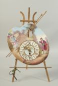 A 19TH CENTURY CONTINENTAL PORCELAIN ARTIST'S PALLET on a gilt easel, as a clock, with gilt and