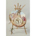 A 19TH CENTURY CONTINENTAL PORCELAIN ARTIST'S PALLET on a gilt easel, as a clock, with gilt and