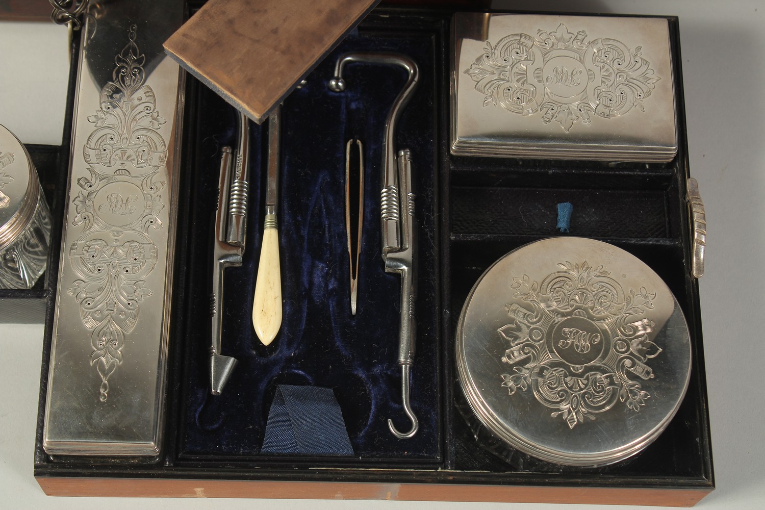 A VERY GOOD VICTORIAN LADIES ROSEWOOD DRESSING CASE with brass banding opening to reveal five silver - Image 5 of 8