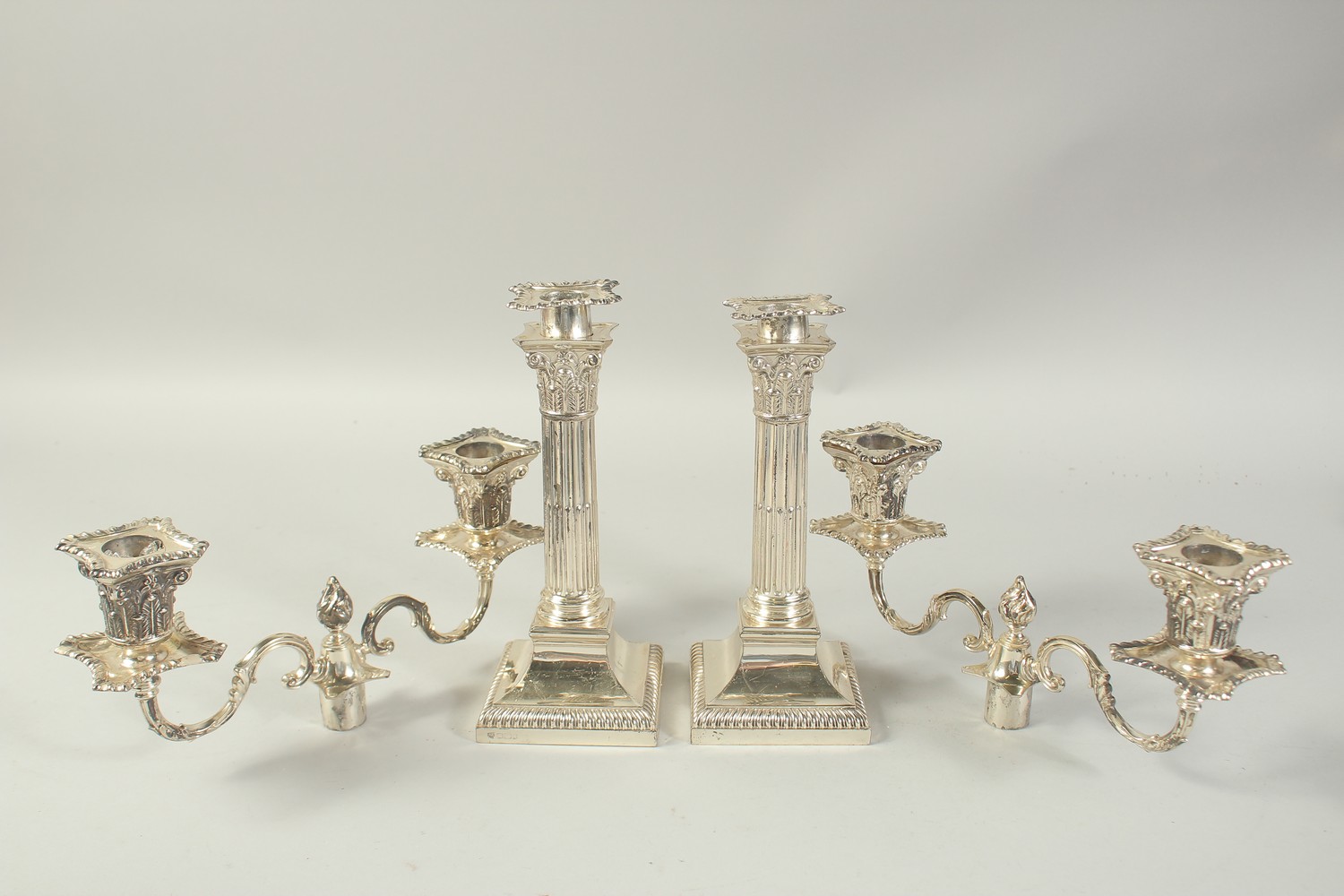 A GOOD PAIR OF TWO BRANCH SILVER CANDLESTICKS with coloums on square bases. 12ins high. London - Image 4 of 6