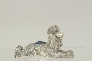 A POODLE PIN CUSHION. 3ins