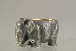 A RUSSIAN SILVER ELEPHANT SALT with silver gilt interior. 5cms long. Marks 84 and Eagle. Weight: