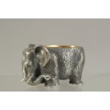 A RUSSIAN SILVER ELEPHANT SALT with silver gilt interior. 5cms long. Marks 84 and Eagle. Weight: