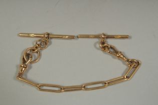 AN 18CT GOLD CHAIN (WATCH GUARD) 7ins long. Stamped: 18ct. Maker: W & S.. Weight: 23gms.