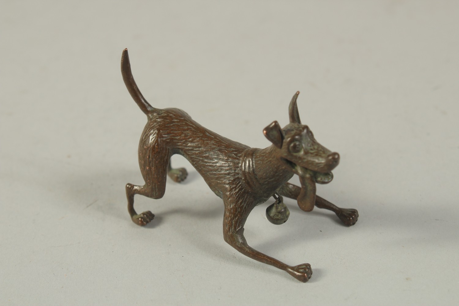 A BRONZE OKIMONO of a Dog. 6cms long. - Image 2 of 2