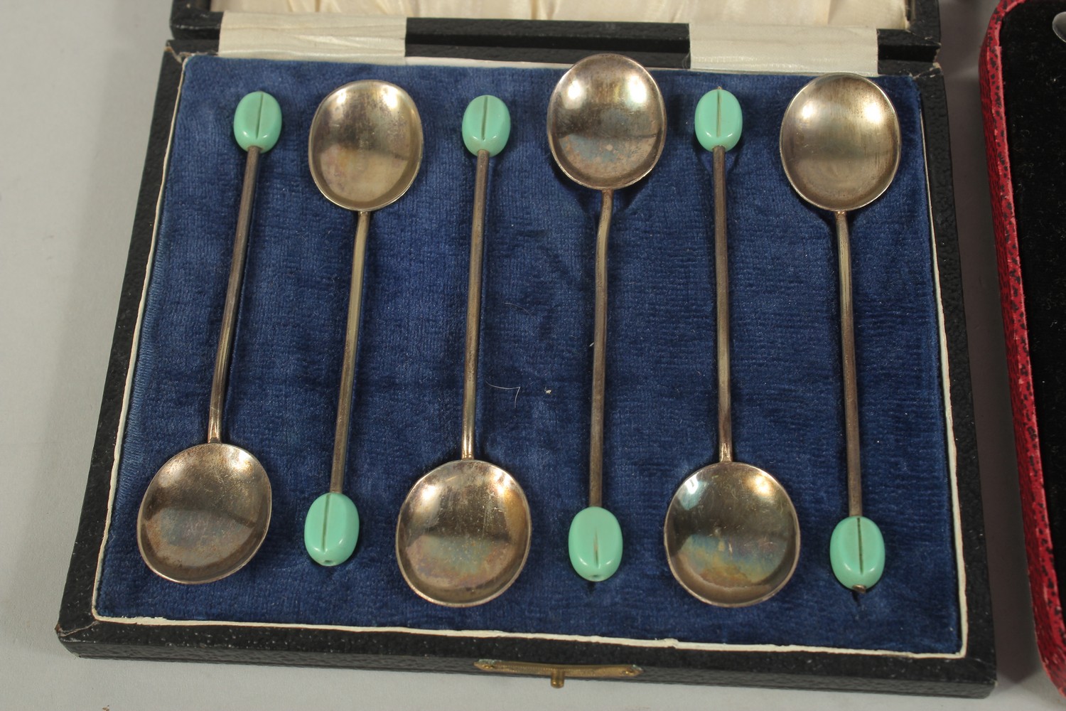 A SET OF SIX SILVER HANDLED TEA KNIVES AND SIX BEAN END COFFEE SPOONS, both cased. - Image 2 of 3