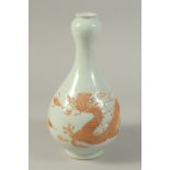 A CHINESE PORCELAIN 'GARLIC HEAD' DRAGON VASE. 28cms high.