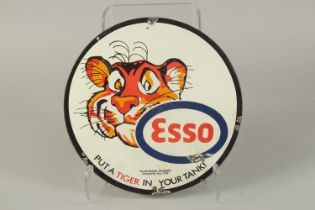 A CIRCULAR ENAMEL SIGN "ESSO". 12ins diameter.