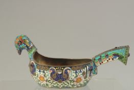 A GOOD RUSSIAN SILVER AND ENAMEL KOVSH in the shape of a bird. Weight: 273gms. 18cms long x 8cms