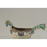 A GOOD RUSSIAN SILVER AND ENAMEL KOVSH in the shape of a bird. Weight: 273gms. 18cms long x 8cms