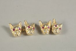 A SMALL PAIR OF RUSSIAN SILVER GILT DOG CUFF LINKS. Mark Head 84. 12.4gms.