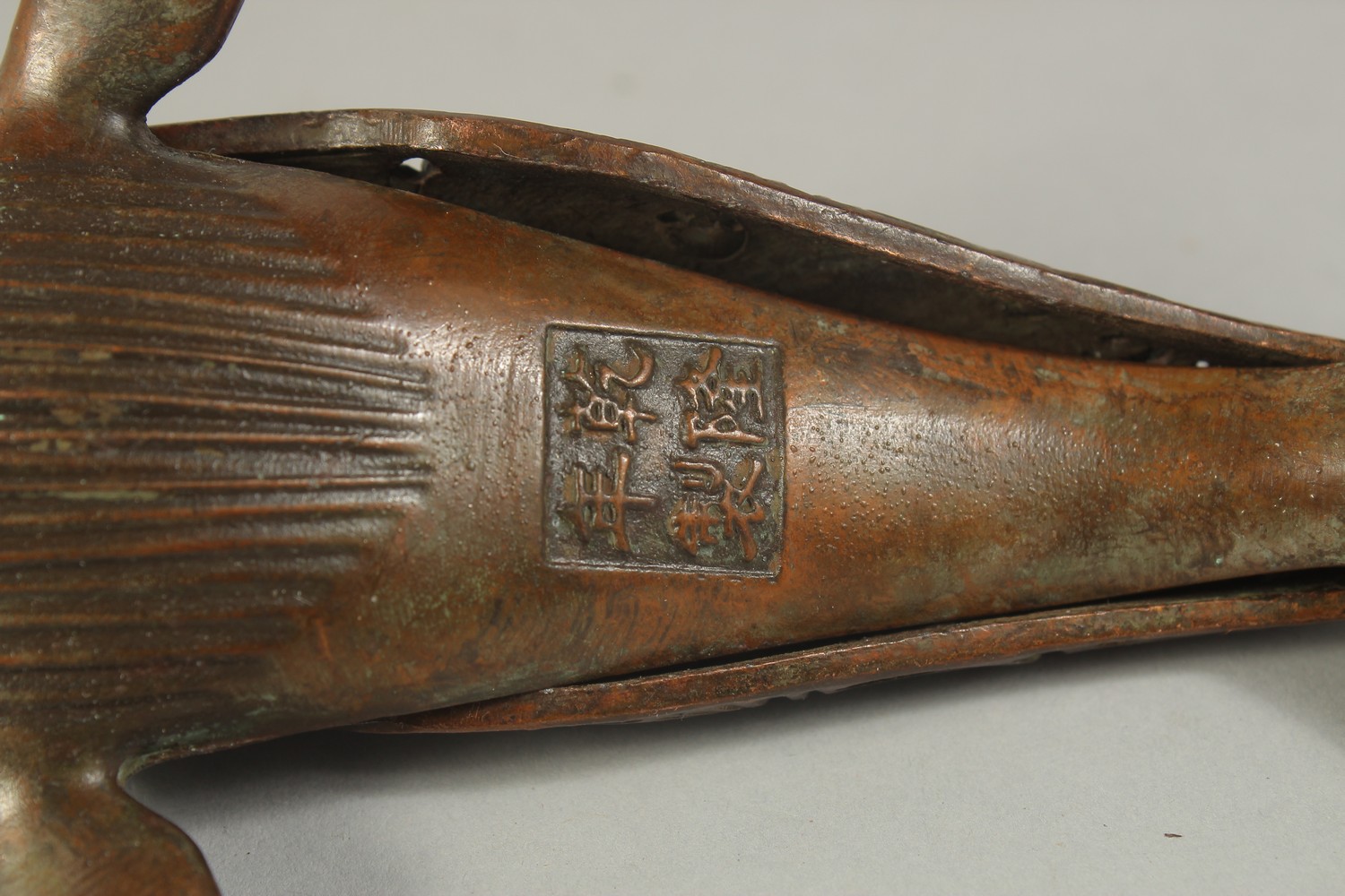 A CHINESE BRONZE FISH CENSER, 16cms long. - Image 3 of 3