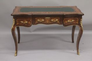 A LOUIS XVI STYLE MAHOGANY INLAID BUREAU PLAT with inset leather top, three frieze drawers and