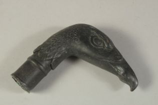 A BRONZE WALKING STICK HANDLE "BIRDS HEAD". 9cms.