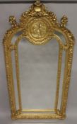 A VERY GOOD LOUIS XVITH DESIGN GILTWOOD MIRROR with cupids, scrolls etc. 7ft high x 2ft 6ins wide.