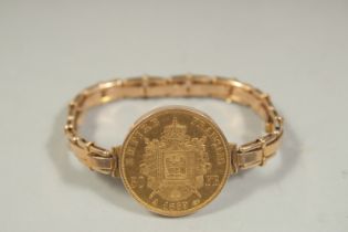 A FRENCH 50 FRANC GOLD COIN BRACELET, dated 1859. Weight: 30gms.