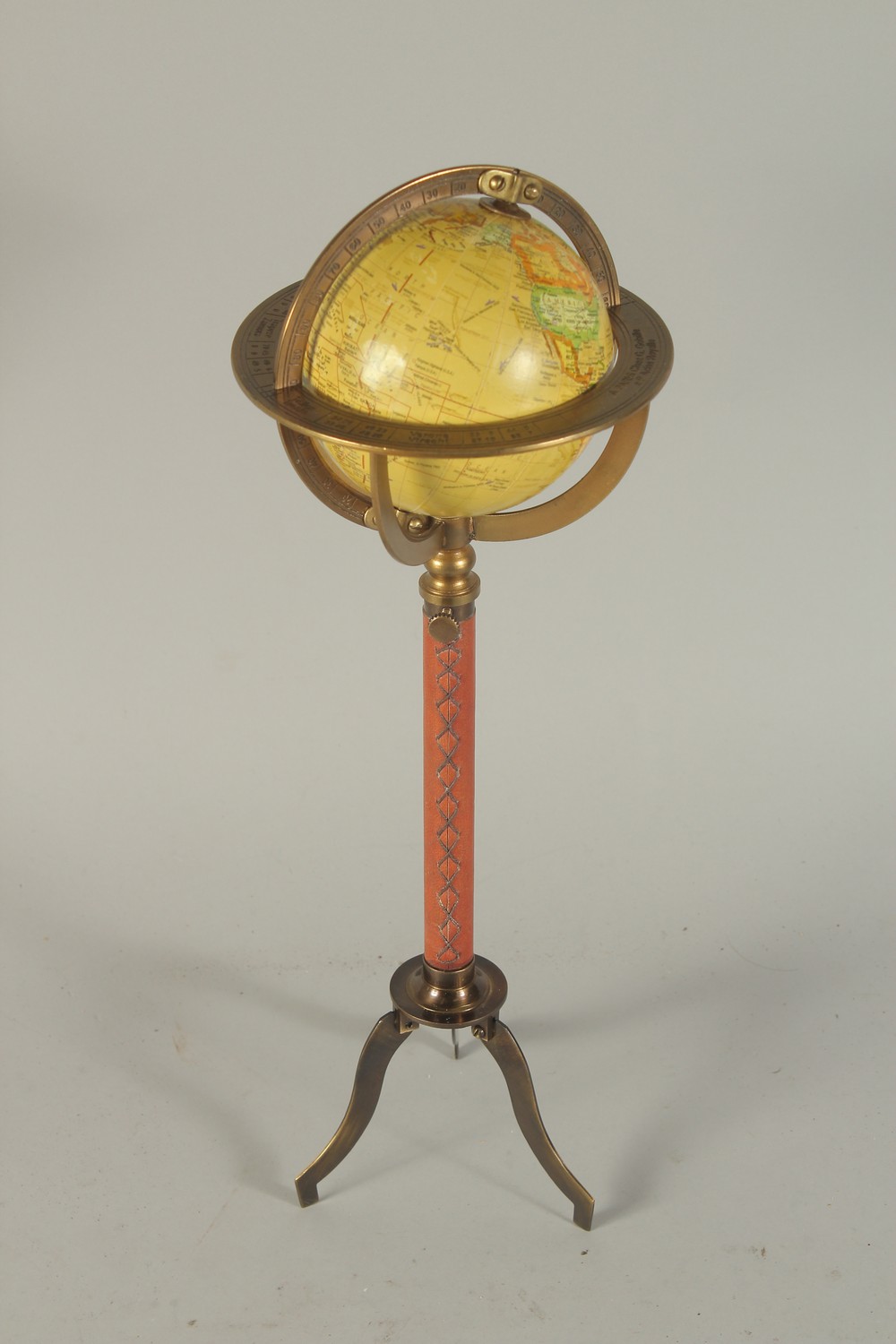 A GLOBE on a stand. 16ins high.