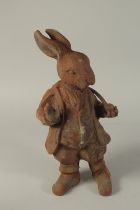 A CAST IRON RABBIT DOORSTOP. 19ins high.