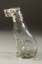 A SILVER PLATED AND GLASS DOG CLARET JUG. 9.5ins high.