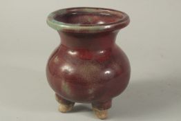 A CHINESE PURPLE SPLASH VASE on three legs. 6ins high.