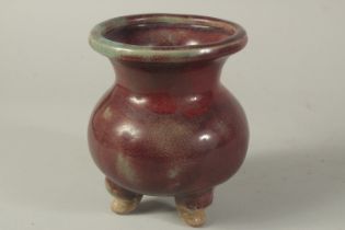 A CHINESE PURPLE SPLASH VASE on three legs. 6ins high.