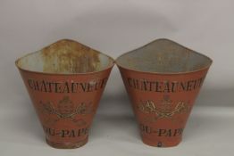A PAIR OF CHATEAUNEUF-DU-PAPE TIN GRAPE HOPPERS.